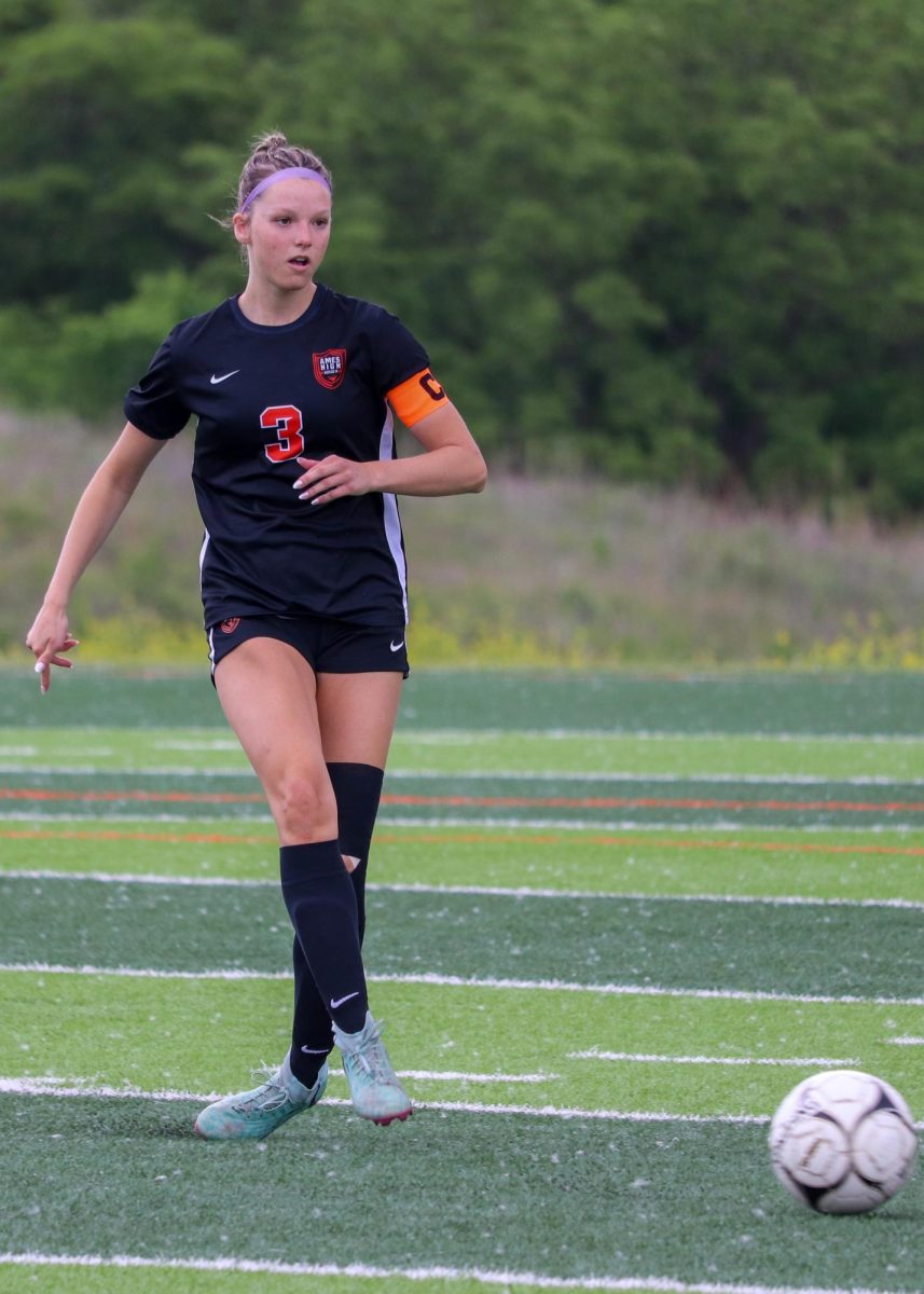 Karsyn Pankonen (3) passes the ball during the Class 3A Region 1 semifinal match against Iowa City West.