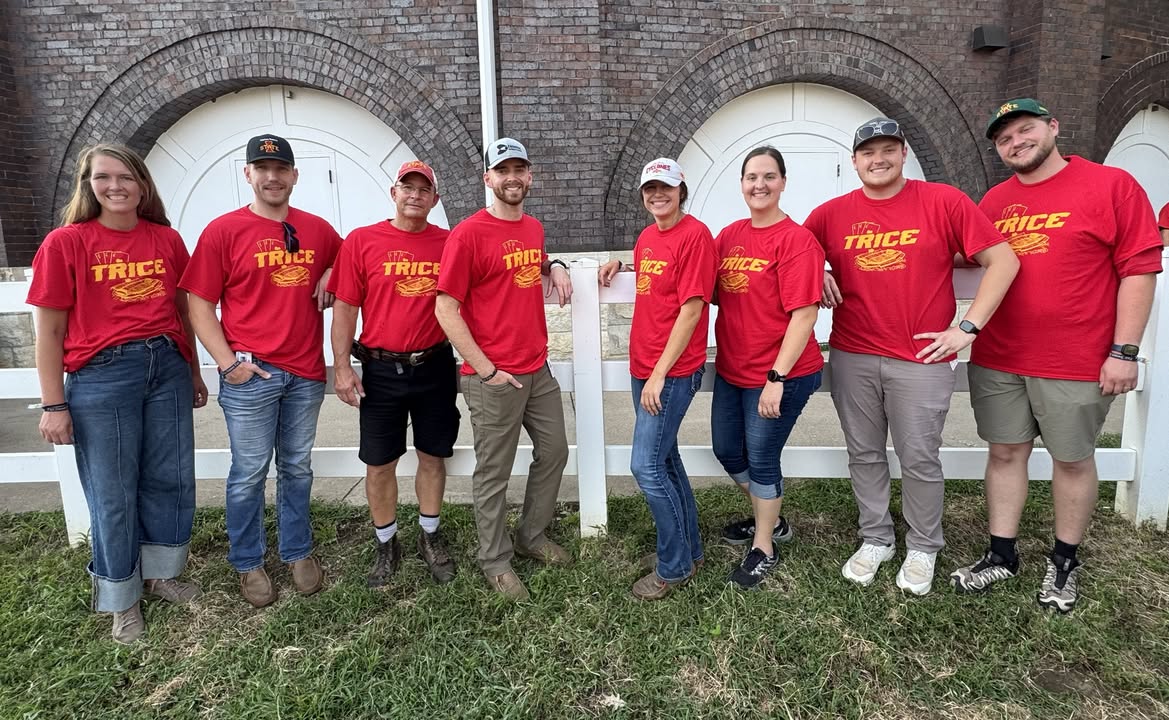 ISU vet students and and veterinarians pose for a photo at the 2025 Iowa State Fair.