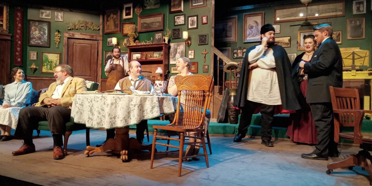 The Sycamore family and their friends are intrigued by Alice's boyfriend Tony, who they are finally meeting. Here the couple (Maggie Bambic and Benjamin Nuckroils), right, talk with Boris Kolenkov (Hayden Reynolds), who teaches the other Sycamore daughter, Essie (Sophie Bass), far left, dance in the ACTORS production of You Can't Take It with You.