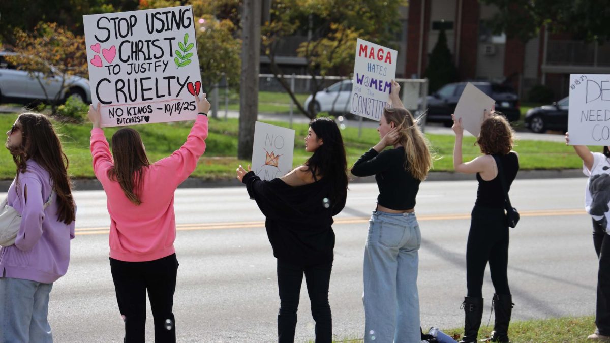 Demonstrators gathered at O’Neil Park on Saturday for the “No Kings” demonstration. The “No Kings” movement is a nationwide protest against the Trump administration’s policies and actions. Demonstrators carried signs, chanted, and marched through the park, voicing their concerns. The rally was organized by local groups, including Indivisible Ames, Democracy Every Day and the League of Women Voters.