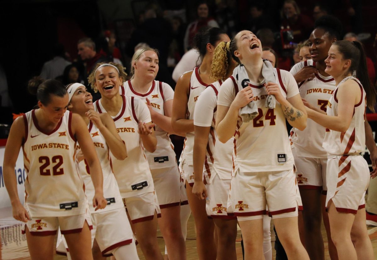 The Iowa State women's basketball smiles doing their traditional postgame dance.