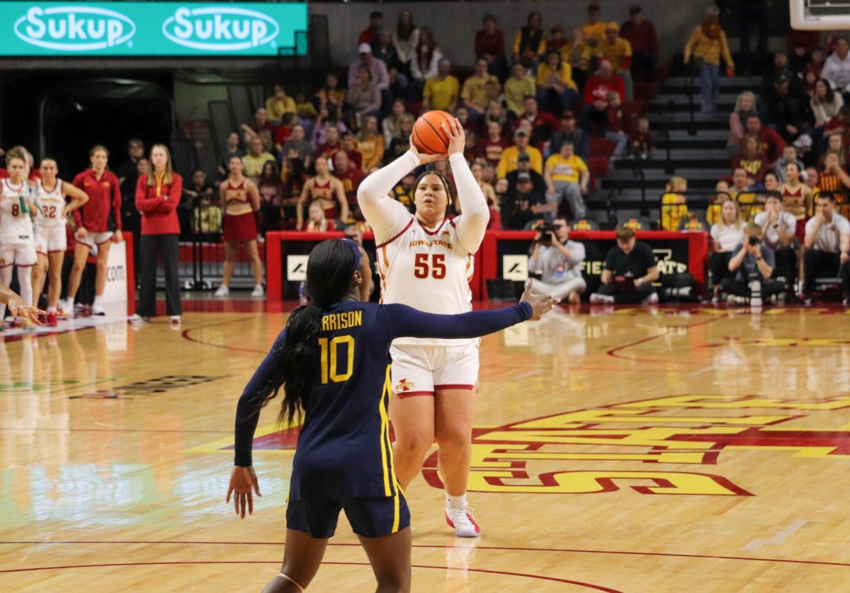 Audi Crooks (55) of Iowa State lines up a 3-point basket from 25 feet away. Crooks connected on her lone attempt from deep.