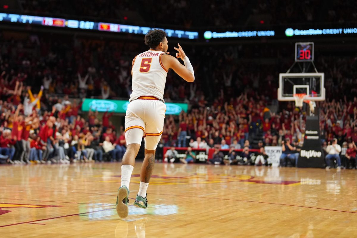 Joshua Jefferson (5) of Iowa State celebrates a 3-point basket by his teammate Milan Momcilovic. (Photo: Iowa State Cyclones)