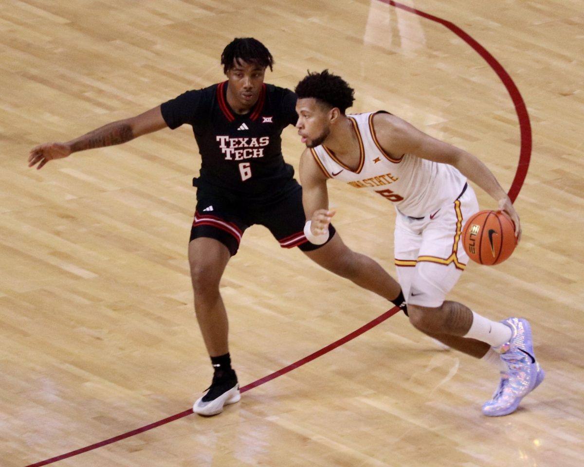 Joshua Jefferson (5) of Iowa State drives against Leon Horner (6) of Texas Tech on Saturday. Jefferson scored a game high 22 points, pulled down five rebounds, dished out five assists and stole the ball five times. 