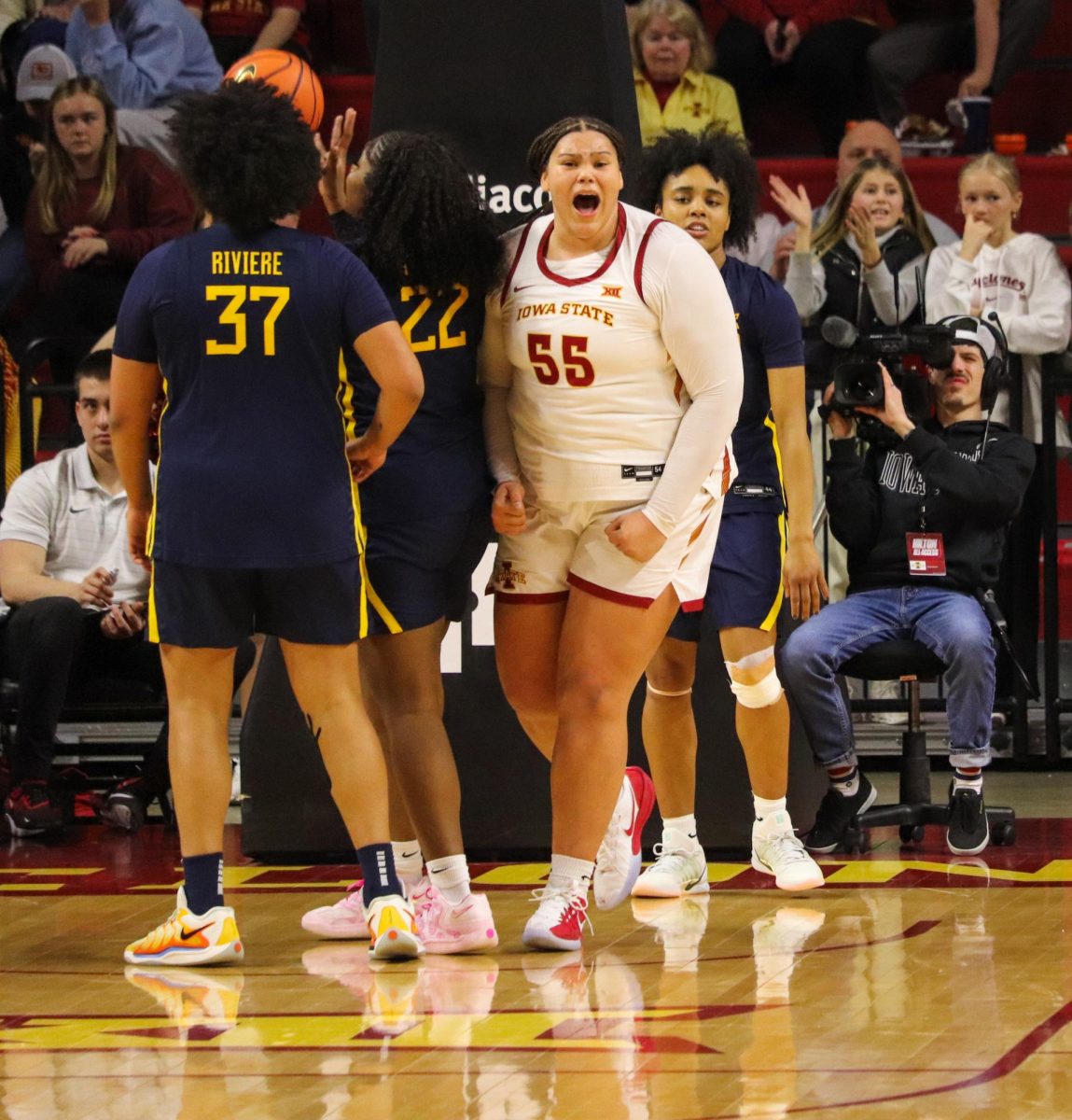 Audi Crooks (55) celebrates a second half and-one opportunity on Sunday. Crooks finished with a team high 22 points.