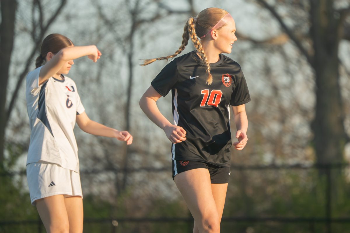 Ames’ Sara Bierbaum (10) runs back to support the midfield against Urbandale during a game at Ames High School on Monday.