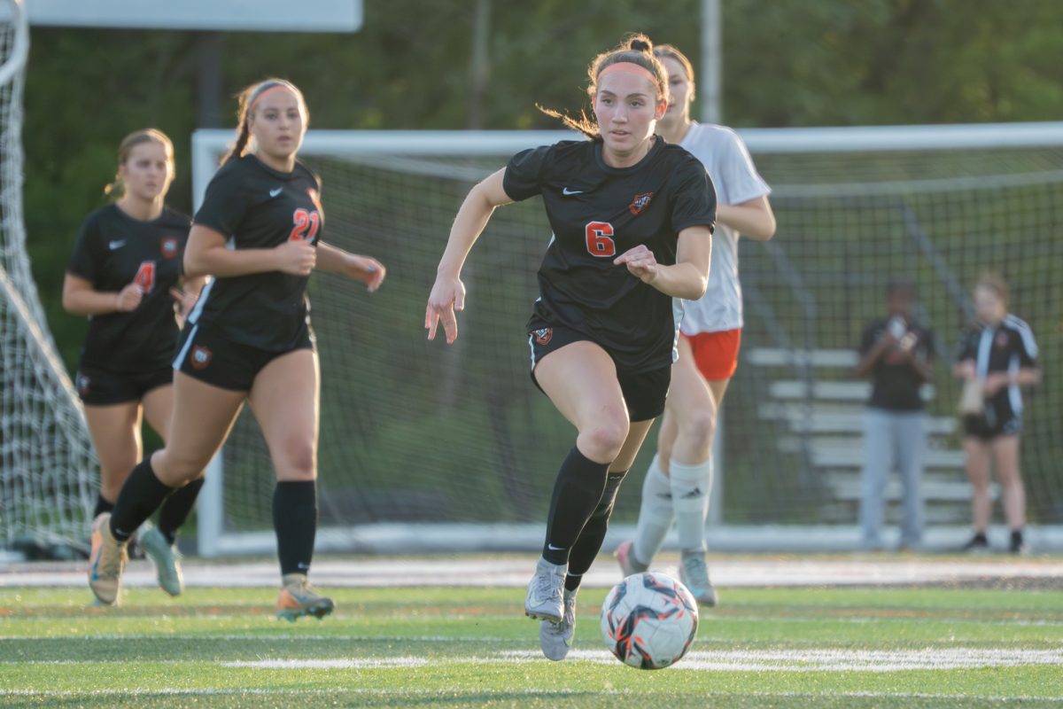 Carly Selsby (6) dribbles down the field as Ames attacks Valley’s defense Tuesday at Ames High School.