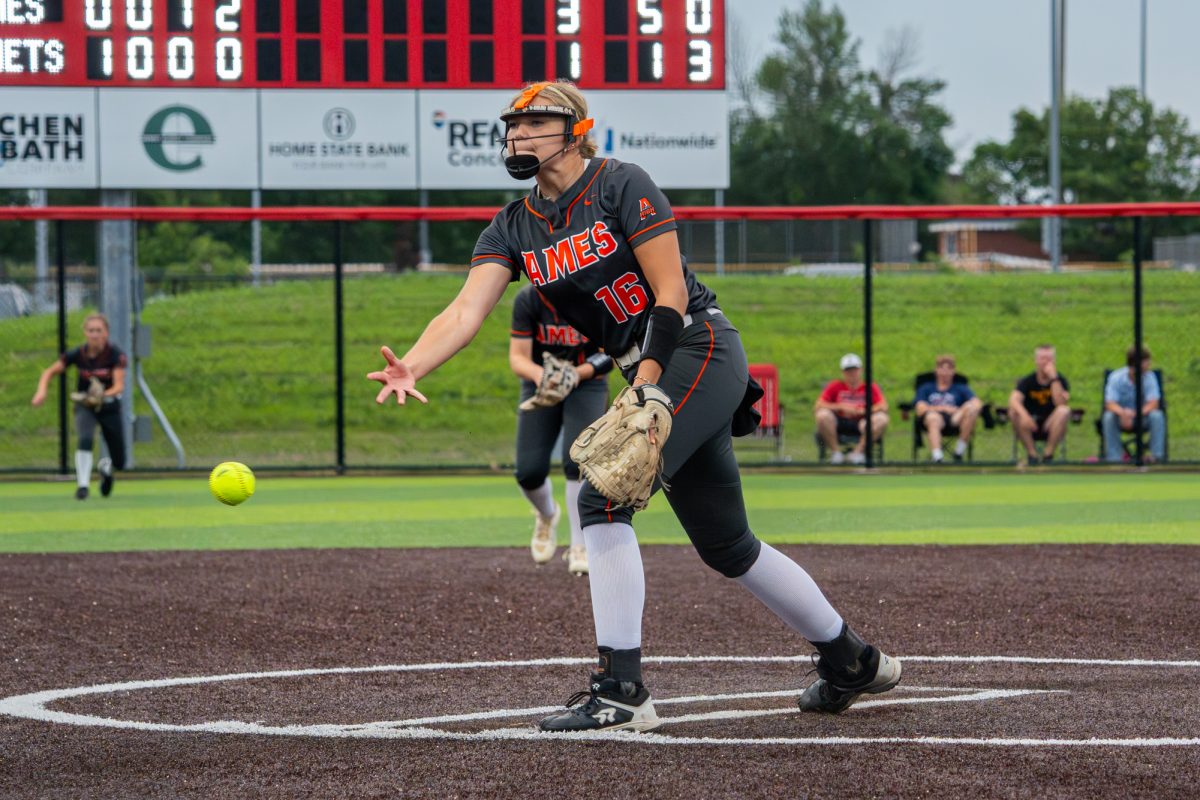 Ames athlete Kiley Sodahl (16) pitches in the bottom of the fourth inning as Ames attempts to end the inning during the game against North Polk at North Polk on Friday.
