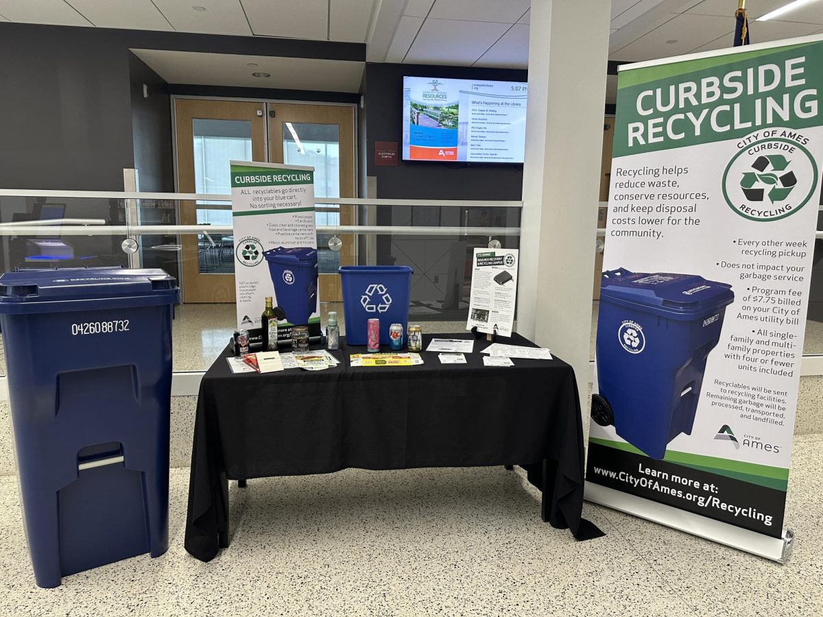 The Ames Public Library's curbside recycling display includes information about acceptable materials and explanations of the new program.