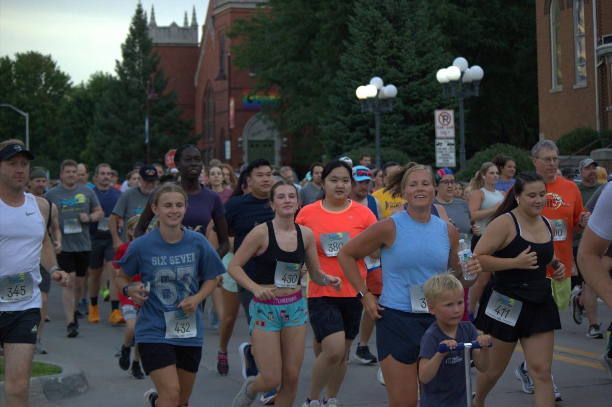 People running in the Midnight Madness 5K.